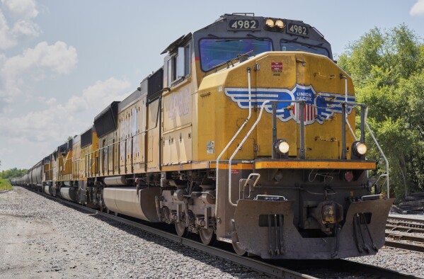 In this July 31, 2018, file photo a Union Pacific train travels through Union, Neb. (AP Photo/Nati Harnik, File)