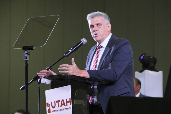 Utah state Rep. Phil Lyman, a candidate for governor, addresses nearly 4,000 delegates at the Utah Republican Party Convention, Saturday, April 27, 2024, in Salt Lake City. (AP Photo/Hannah Schoenbaum)