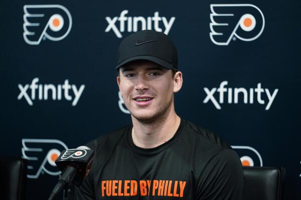 Carter Hart of the Philadelphia Flyers stands for the National Anthem