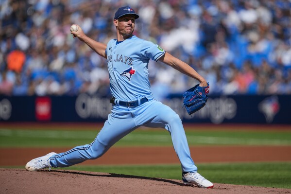 Kirk has 3 RBIs, Bassitt pitches 8 innings as Blue Jays blank Nationals 7-0