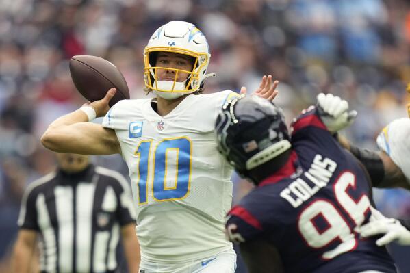 Los Angeles Chargers quarterback Justin Herbert (10) throws during the  second half of an NFL fo …