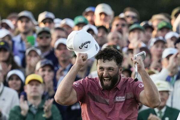 FILE - Jon Rahm, of Spain, celebrates on the 18th green after winning the Masters golf tournament at Augusta National Golf Club on Sunday, April 9, 2023, in Augusta, Ga. The majors lacked drama, but not inspiration or phenomenal play. The last big event is the Ryder Cup. (AP Photo/Mark Baker, File)