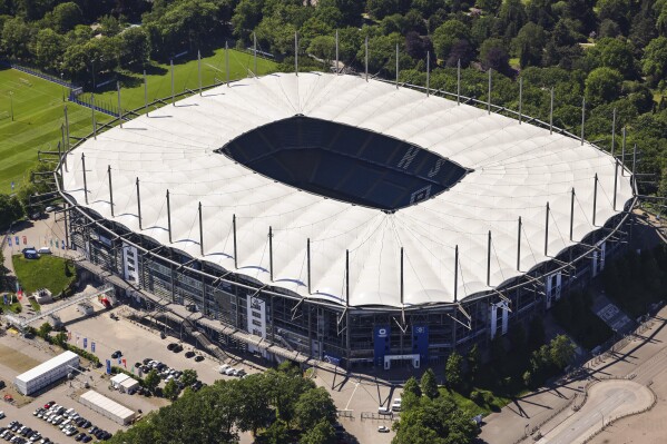 FILE - A view of the Volksparkstadion (Volkspark stadium) ahead of the European Soccer Championships 2024 in Germany, in Hamburg, Germany, Tuesday May 14, 2024. The European Championship in Germany is all about tried and tested stadiums with a rich soccer history. Unlike at some recent World Cups, there's been no rush to finish stadiums on time. (Christian Charisius/dpa via AP, File)