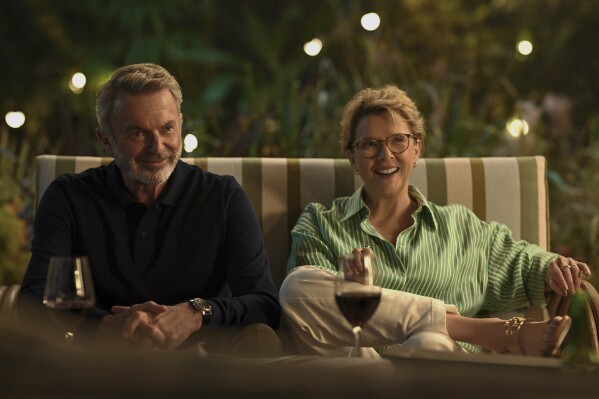This image released by Peacock shows Sam Neill, left, and Annette Bening in a scene from "Apples Never Fall." (Jasin Boland/Peacock via AP)