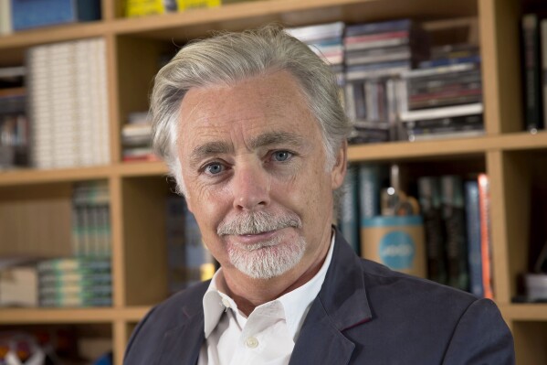 This image released by Macmillan Children's Publishing Group shows author Eoin Colfer. (Mary Browne via AP)
