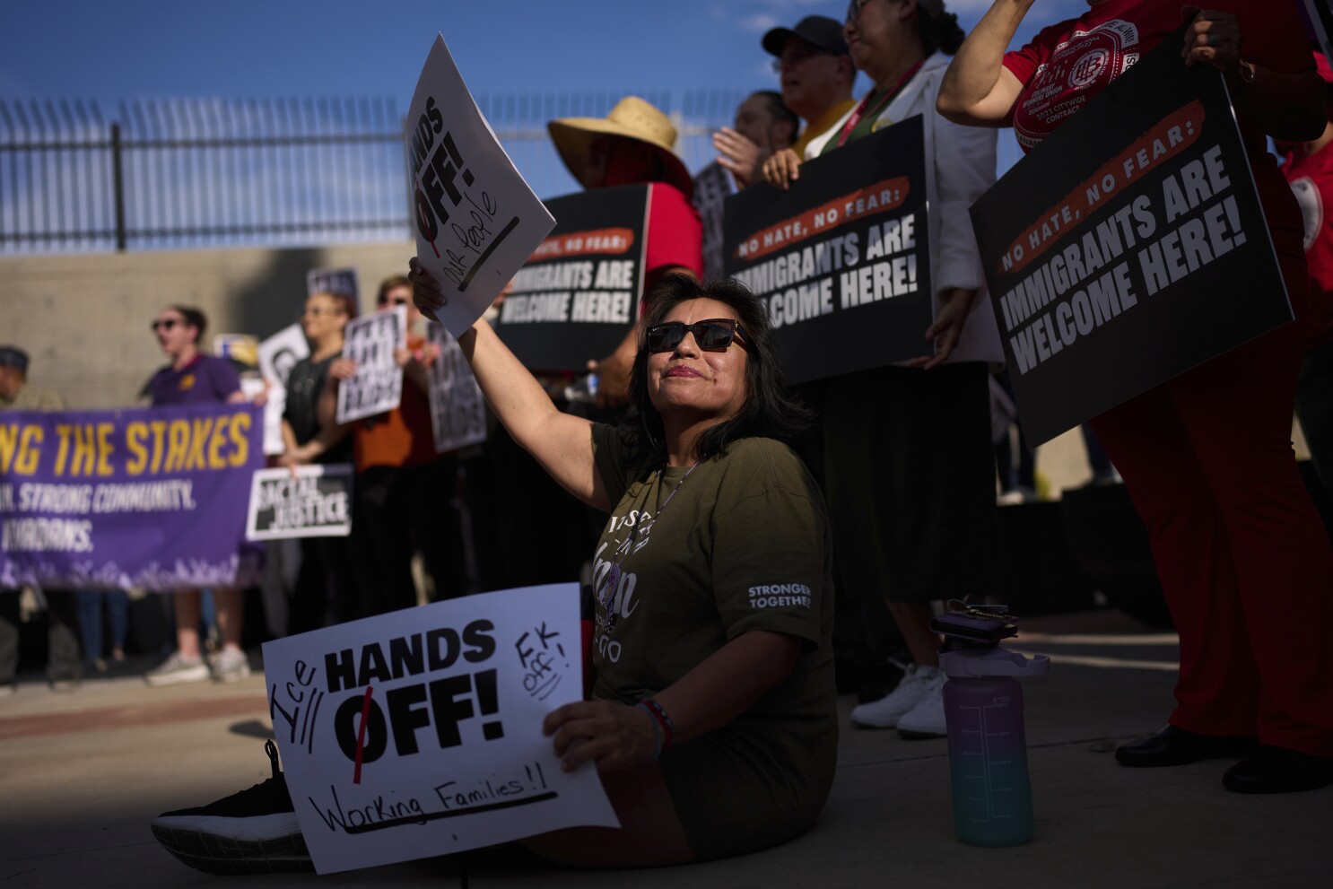 Protests over immigration raids pop up across the US