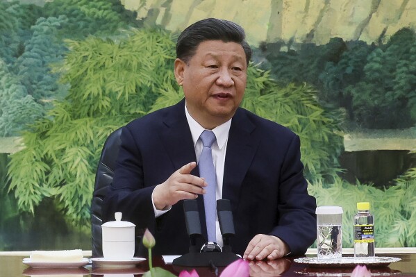 FILE - Chinese President Xi Jinping gestures as he meets with U.S. Secretary of State Antony Blinken in the Great Hall of the People in Beijing, China, on June 19, 2023. Xi will attend next week's summit of the BRICS nations in Johannesburg, to be followed by a state visit to South Africa, the Foreign Ministry said Friday, AUg. 18, 2023. (Leah Millis/Pool Photo via AP, File)