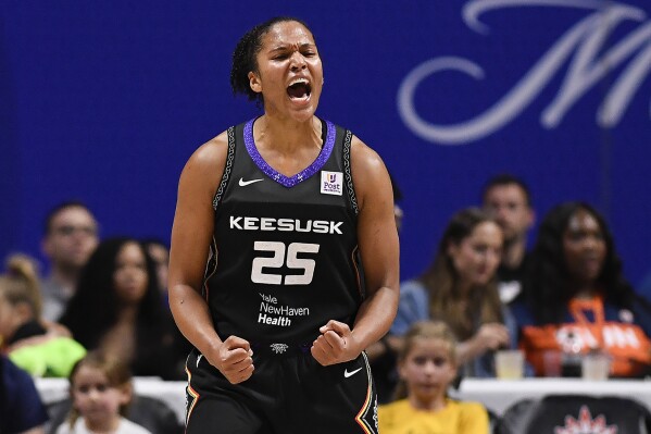 Connecticut Sun forward Alyssa Thomas (25) reacts during the third quarter of a WNBA basketball game against the Indiana Fever, Tuesday, May 14, 2024, in Uncasville, Conn. (AP Photo/Jessica Hill)