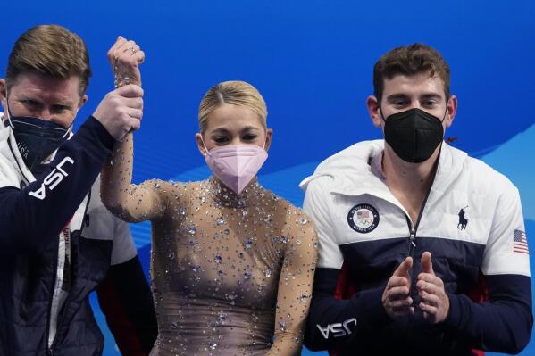 Alexa Knierim and Brandon Frazier, right, of the United States, react after competing in the pairs free skate program during the figure skating competition at the 2022 Winter Olympics, Saturday, Feb. 19, 2022, in Beijing. (AP Photo/Natacha Pisarenko)