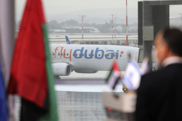 FILE - A welcoming ceremony is held for the first arrival of a flydubai commercial flight to Israel, at Ben-Gurion International Airport, Israel, on Nov. 26, 2020. Dubai-based budget carrier FlyDubai saw record profits of $572 million in 2023, boosted by carrying the most passengers ever across its network, the company announced Thursday, Feb. 22, 2024.(Emil Salman/Pool via 番茄直播, File)