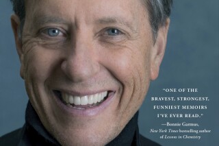 This cover image released by Simon & Schuster shows "A Pocketful of Happiness" by Richard E. Grant. (Simon & Schuster via AP)