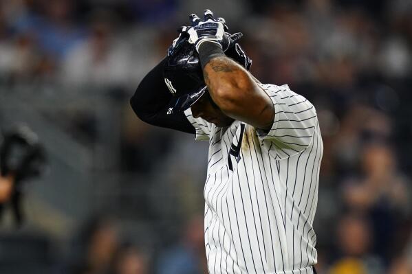 New York Yankees' Kyle Higashioka tosses his bat aside after a hit