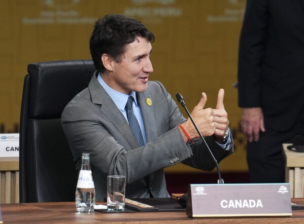 Canadian Prime Minister Justin Trudeau takes part in the APEC Leaders' Informal Dialogue at the APEC Summit in Lima, Peru, Friday, Nov. 15, 2024. (Sean Kilpatrick/The Canadian Press via AP)