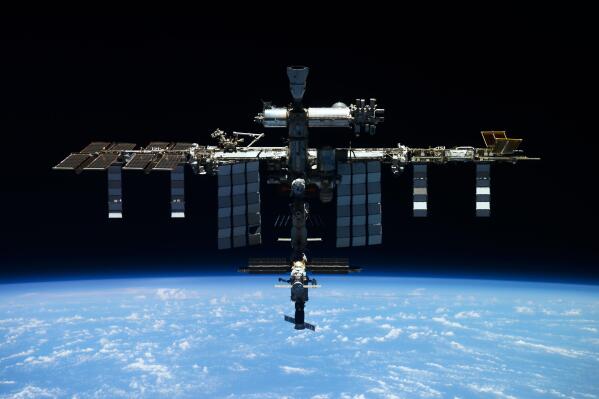 This undated photo released by Roscosmos State Space Corporation shows the International Space Station (ISS). An uncrewed Russian supply ship docked at the International Space Station has lost cabin pressure, the Russian space corporation said Saturday, noting that the incident doesn't pose any danger to the station's crew. (Roscosmos State Space Corporation via AP)