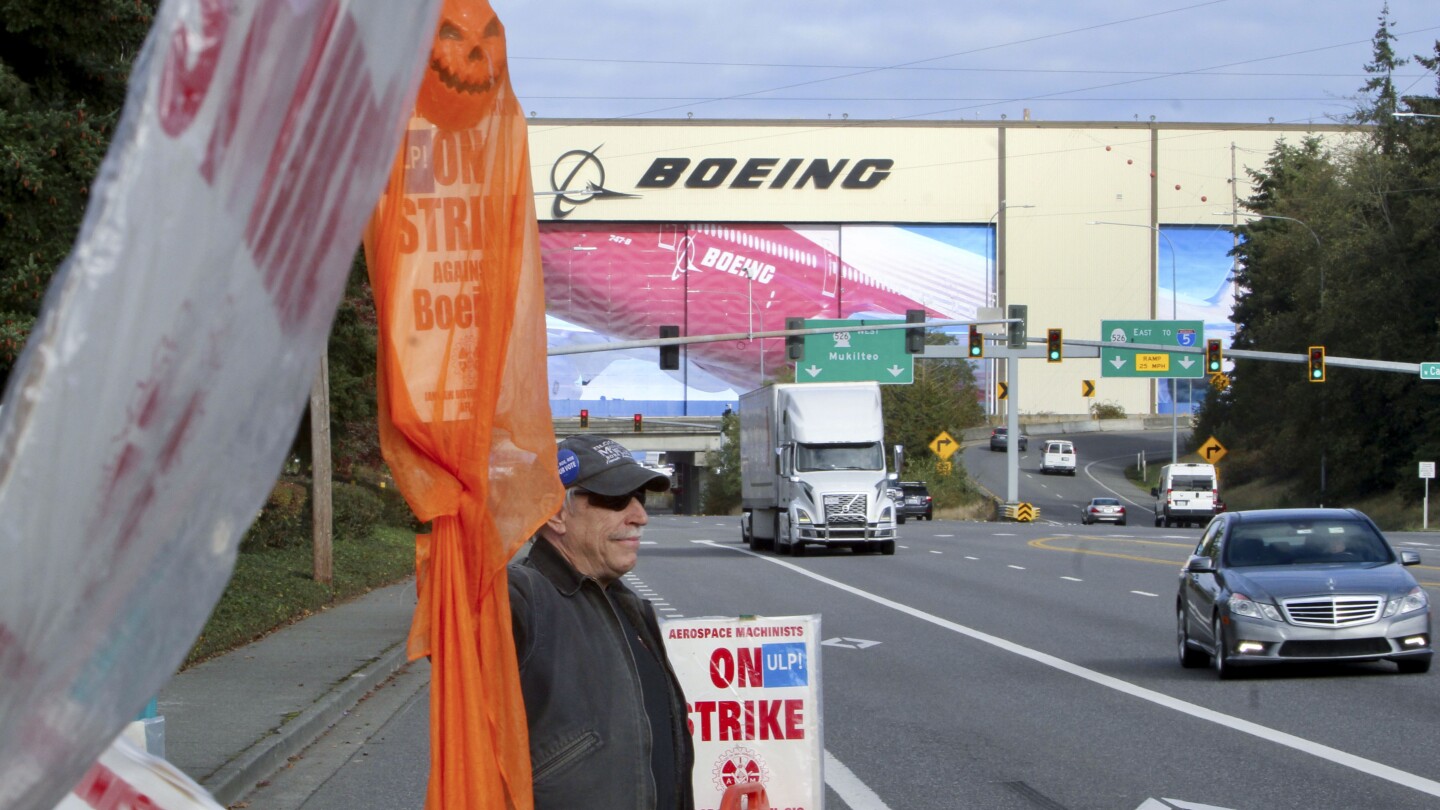 Boeing experiences  billion quarterly loss as putting employees vote whether or not to simply accept contract be offering