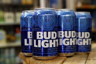 FILE - In a Thursday Jan. 10, 2019 file photo, cans of Bud Light beer are seen in Washington. Amid conservative backlash over Bud Light’s partnership with a transgender influencer, some are falsely claiming brewer Anheuser-Busch fired its entire marketing department. (AP Photo/Jacquelyn Martin, File)