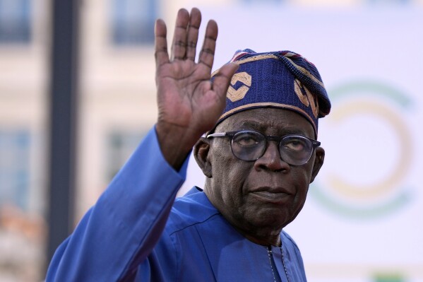 FILE - Nigeria's President Bola Tinubu arrives for the closing session of the New Global Financial Pact Summit, Friday, June 23, 2023 in Paris. Nigeria's leader said Tuesday that his government will embark on “massive education” of youth as one way to tackle the increasing kidnappings for ransom now threatening the capital city along with the rest of the country's conflict-hit north.(AP Photo/Lewis Joly, Pool, File)