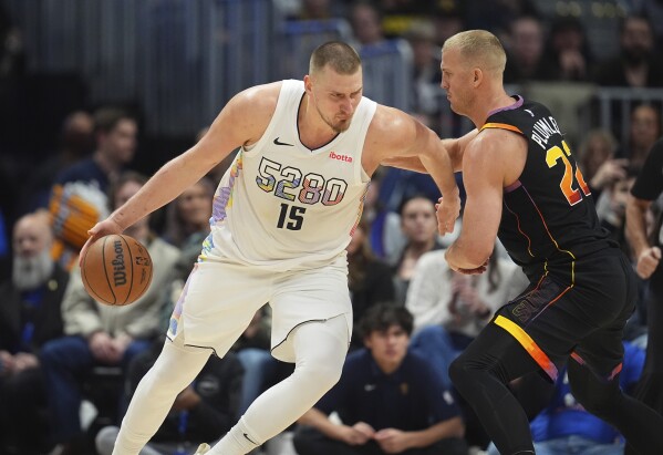 Nikola Jokic makes NBA history with 30-20-20 triple-double in Nuggets' OT  win over Suns | AP News