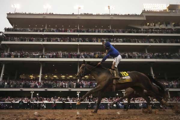 Sovereignty, ridden by Junior Alvarado, crosses the finish line to win the 151st running of the Kentucky Derby horse race at Churchill Downs Saturday, May 3, 2025, in Louisville, Ky. (AP Photo/Abbie Parr)