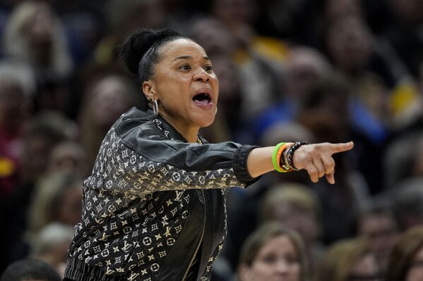 South Carolina coach Dawn Staley says transgender athletes should be allowed to play | AP News