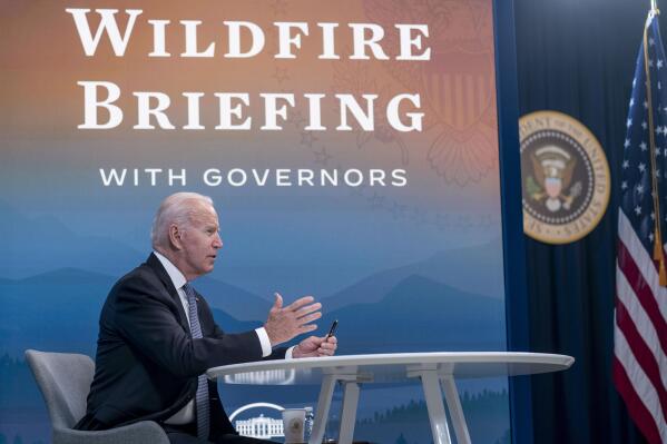 President Joe Biden speaks during a meeting with governors to discuss ongoing efforts to strengthen wildfire prevention, preparedness and response efforts, and hear firsthand about the ongoing impacts of the 2021 wildfire season in the South Court Auditorium in the Eisenhower Executive Office Building on the White House Campus in Washington, Friday, July 30, 2021. (AP Photo/Andrew Harnik)
