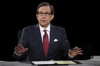 FILE - In this Oct. 19, 2016 file photo, moderator Chris Wallace guides the discussion during the presidential debate at UNLV in Las Vegas.  All eyes are on Fox's Chris Wallace as he prepares to moderate the first presidential debate. Wallace is the only journalist moderating one of the four debates this fall who has been there before: he was the onstage referee for the third meeting between President Donald Trump and Hillary Clinton.  (Joe Raedle/Pool via AP, File)