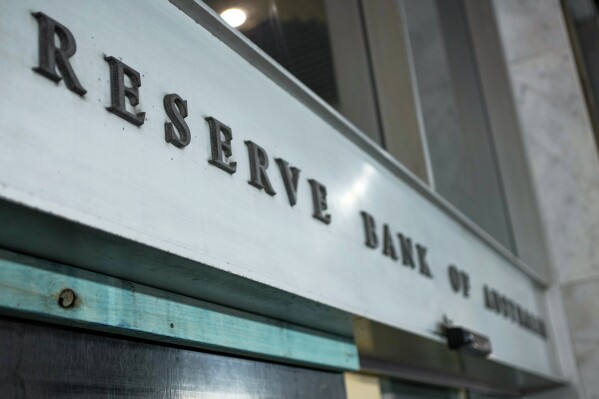 A sign of the Reserve Bank of Australia is seen in the central business district in Sydney, Australia, Tuesday, Nov. 7, 2023. Australia's central bank has lifted interest rates for the first time in five months, taking the official cash rate up by a quarter of a percentage point to 4.35 per cent. Australia’s central bank lifted its benchmark interest rate Tuesday for the first time since June with a quarter percentage point hike that brought the cash rate to a 12-year high of 4.35%. (AP Photo/Mark Baker)
