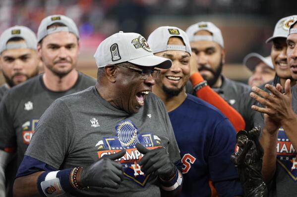 Houston Astros manager Dusty Baker Jr. and the Houston Astros celebrate their 4-1 World Series win against the Philadelphia Phillies in Game 6 on Saturday, Nov. 5, 2022, in Houston. (AP Photo/David J. Phillip)