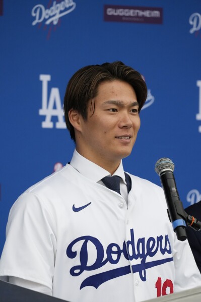 Yamamoto's contract with Dodgers includes 2 opt outs, but timing depends on  elbow health