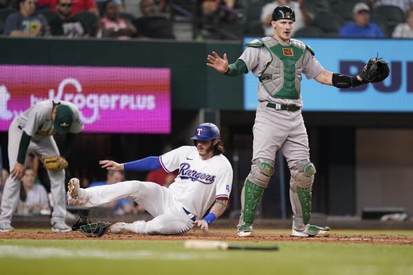 Seager HR, Smith inside-park shot send Rangers past A's 10-8