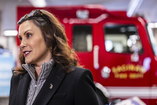 Michigan Gov. Gretchen Whitmer answers media questions after a roundtable discussion about the Lowering MI Costs plan at the Saginaw Fire Department, Thursday, Jan. 18, 2024, in Saginaw, Mich. (Kaytie Boomer/Saginaw News via AP)