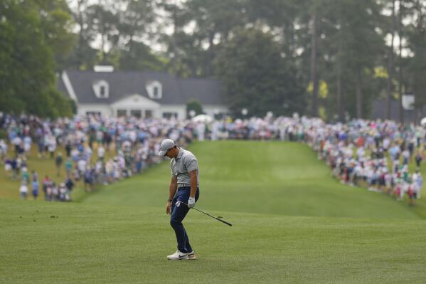 Rory McIlroy, of Northern Ireland, reacts to his shot on the first hole during the second round of the Masters golf tournament at Augusta National Golf Club on Friday, April 7, 2023, in Augusta, Ga. (AP Photo/Matt Slocum)