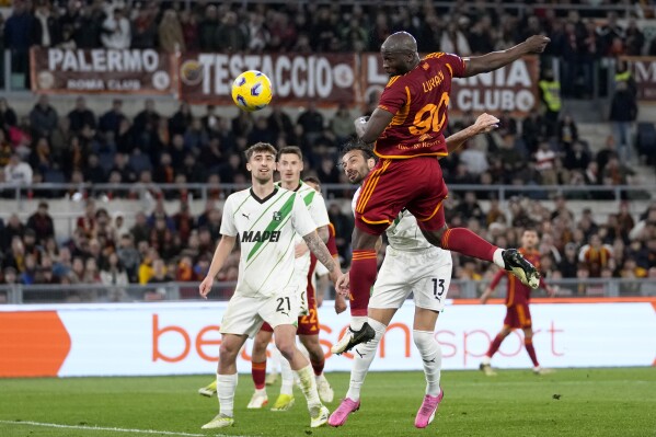 Roma's Romelu Lukaku attempts a header at goal during a Serie A soccer match between Roma and Sassuolo, at Rome's Olympic Stadium, Sunday, March 17, 2024. (AP Photo/Andrew Medichini)