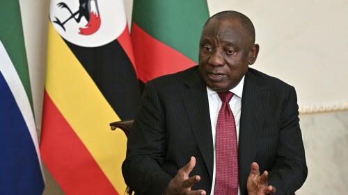 FILE - In this photo provided by Photo host Agency RIA Novosti, South African President Cyril Ramaphosa gestures while speaking to Russian President Vladimir Putin, not in photo, during their talks after a meeting in St. Petersburg, Russia, June 17, 2023. South Africa's president said Tuesday, July 18, 2023 that arresting Putin — should he show up at an economic summit next month in Johannesburg — would amount to a “declaration of war” by his country. (Ramil Sitdikov/Photo host Agency RIA Novosti via AP)