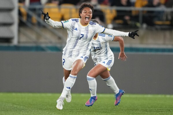 Philippines' Sarina Bolden reacts after scoring her team's first goal during the Women's World Cup Group A soccer match between New Zealand and the Philippines in Wellington, New Zealand, Tuesday, July 25, 2023. (AP Photo/John Cowpland)