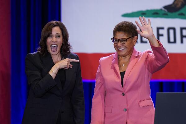 Vice President Kamala Harris, left, points to Los Angeles mayoral candidate Rep. Karen Bass, D-Calif., after speaking at a campaign rally in Los Angeles, Monday, Nov. 7, 2022. (AP Photo/Jae C. Hong)