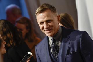 FILE - Actor Daniel Craig attends The Opportunity Network's 11th Annual Night of Opportunity Gala at Cipriani Wall Street, Monday, April 9, 2018 in New York. Could it be the curse of the Scottish play? Daniel Craig’s return to Broadway in a new version of “Macbeth” has been temporarily halted after the actor contracted COVID-19. (Photo by Evan Agostini/Invision/AP, File)