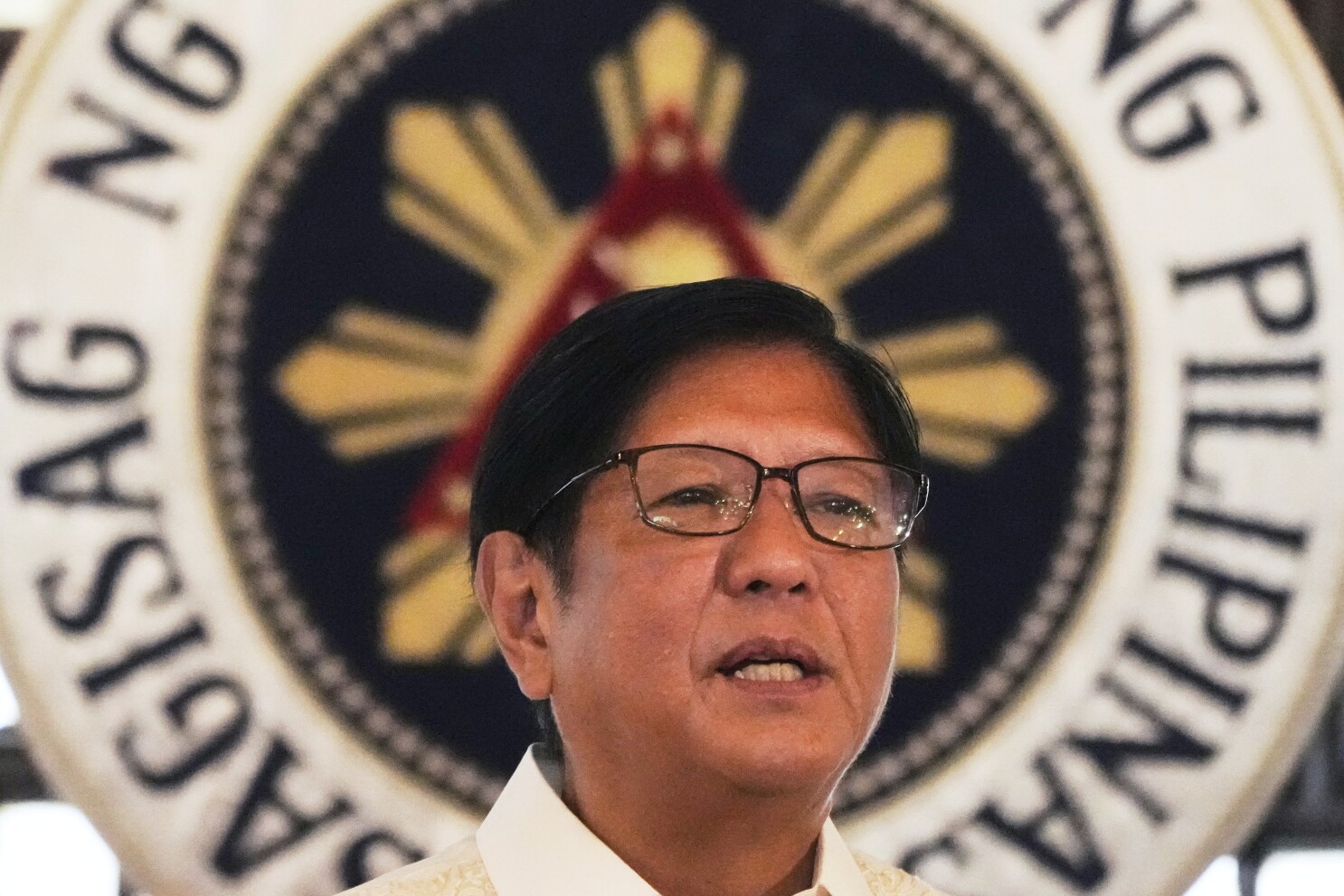 Philippine president's Cabinet revamp retains defense chief, a vocal critic of China's aggression