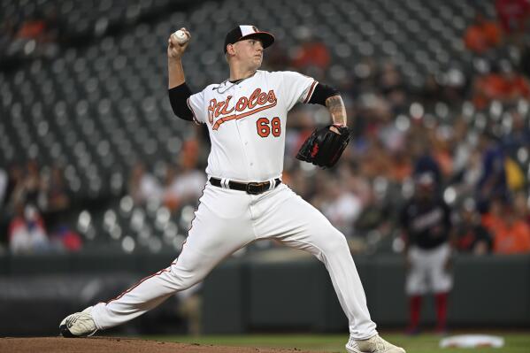 Baltimore Orioles pitcher Tyler Wells throws to a Washington Nationals batter during the first inning of a baseball game Wednesday, June 22, 2022, in Baltimore. (AP Photo/Gail Burton)