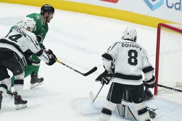 Dallas Stars right wing Alexander Radulov (47) scores a goal against Los Angeles Kings defenders Mikey Anderson (44), Drew Doughty (8) and goaltender Cal Petersen during the second period of an NHL hockey game in Dallas, Wednesday, March 2, 2022. (AP Photo/LM Otero)
