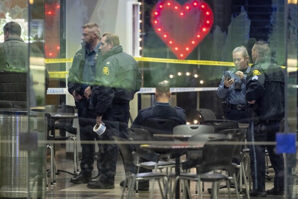 Police work the scene of a shooting at Crown Center on Wednesday, Jan. 17, 2024, in Kansas City, Mo. (Nick Wagner/The Kansas City Star via AP)