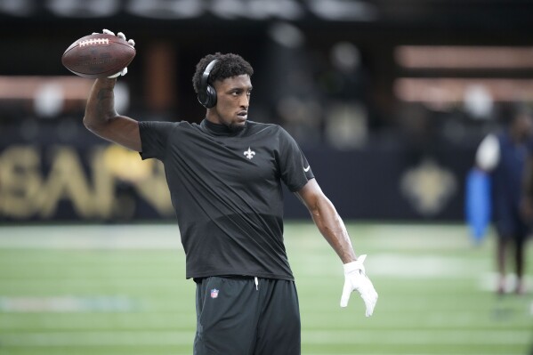 FILE - New Orleans Saints wide receiver Michael Thomas warms up for the team's NFL football game against the Chicago Bears in New Orleans, Nov. 5, 2023. Thomas has been accepted into a pre-trial diversion program that could help him avoid trial in a case stemming from his arrest last fall. City of Kenner (La.) spokeswoman Valerie Brolin says “once all matters and requirements are satisfied, the case can be closed.” Last season was Thomas' last under contract with New Orleans and he has not signed with another team. (AP Photo/Gerald Herbert, File)