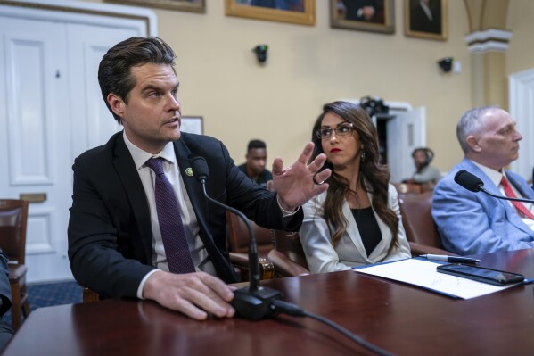 FILE - From left, Rep. Matt Gaetz, R-Fla., Rep. Lauren Boebert, R-Colo., and Rep. Scott Perry, R-Pa., propose amendments to the Department of Homeland Security Appropriations Bill before the House Rules Committee, at the Capitol in Washington, Friday, Sept. 22, 2023. (AP Photo/J. Scott Applewhite, File)