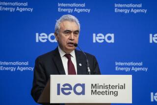 FILE - IEA Executive Director Fatih Birol speaks during the closing media conference at the International Energy Agency (IEA) ministerial meeting in Paris, Thursday, March 24, 2022. The International Energy Agency said Thursday, April 7, 2022 that its member countries are releasing 60 million barrels of oil from their emergency reserves on top of previous U.S. pledges to take aim at energy prices that have soared since Russia invaded Ukraine. IEA Executive Director Fatih Birol said. “Events in Ukraine are becoming more distressing by the day, and action by the IEA at this time is needed to relieve some of the strains in energy markets.”(AP Photo/Michel Euler, File)