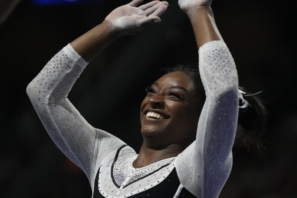 Simone Biles reacts after performing on the vault at the U.S. Classic gymnastics competition Saturday, Aug. 5, 2023, in Hoffman Estates, Ill. (AP Photo/Erin Hooley)