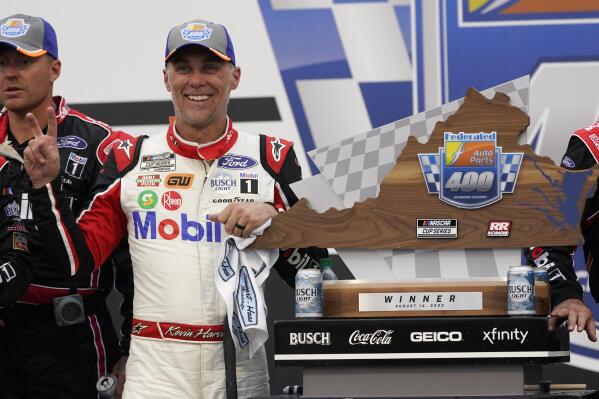 Kevin Harvick celebrates after winning a NASCAR Cup Series auto race at Richmond Raceway, Sunday, Aug. 14, 2022, in Richmond, Va. (AP Photo/Steve Helber)