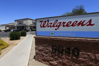 FILE - A Walgreens store is seen, June 25, 2018, in Peoria, Ariz. Some Walgreens pharmacy staff walked off the job this week over concerns that working conditions are putting employees and patients at risk. Organizers on Tuesday, Oct. 10, 2023, estimated that more than 300 Walgreens locations — out of nearly 9,000 nationwide — were affected by walkouts planned for Monday, Oct. 9, through Wednesday, Oct. 11. A company spokesperson said “no more than a dozen” pharmacies experienced disruptions. (AP Photo/Ross D. Franklin, File)