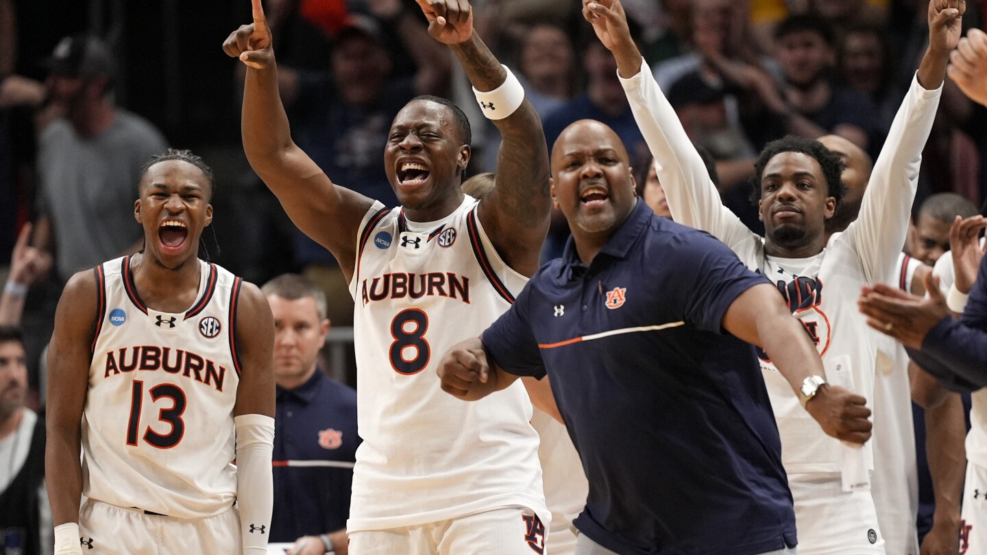 Top-seeded Auburn rallies in 2nd half, beats Michigan 78-65 in Sweet 16 of March Madness