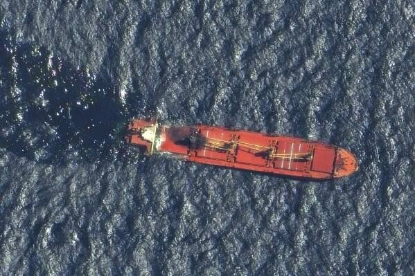 This satellite image taken by Maxar Technologies shows the Belize-flagged ship Rubymar in the Red Sea on Friday, March 1, 2024. The Rubymar, earlier attacked by Yemen's Houthi rebels, has sunk in the Red Sea after days of taking on water, officials said Saturday, March 2, 2024, the first vessel to be fully destroyed as part of their campaign over Israel's war against Hamas in the Gaza Strip. (Maxar Technologies via AP)