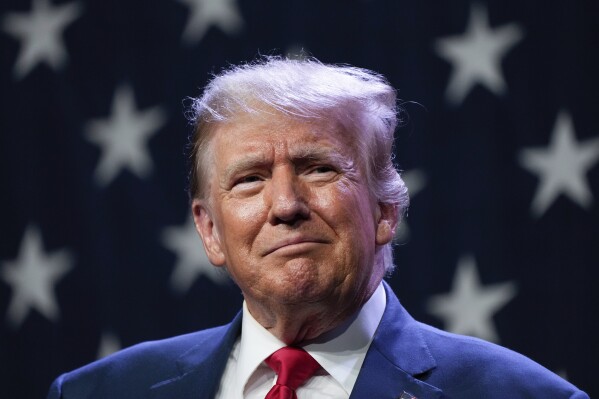 FILE - Republican presidential candidate former president Donald Trump speaks at the Republican Party of Iowa's 2023 Lincoln Dinner in Des Moines, Iowa, July 28, 2023. (AP Photo/Charlie Neibergall, File)